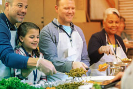 Volunteers serving food
